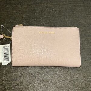 Brand new with tags Michael Kors tech accessory wristlet
